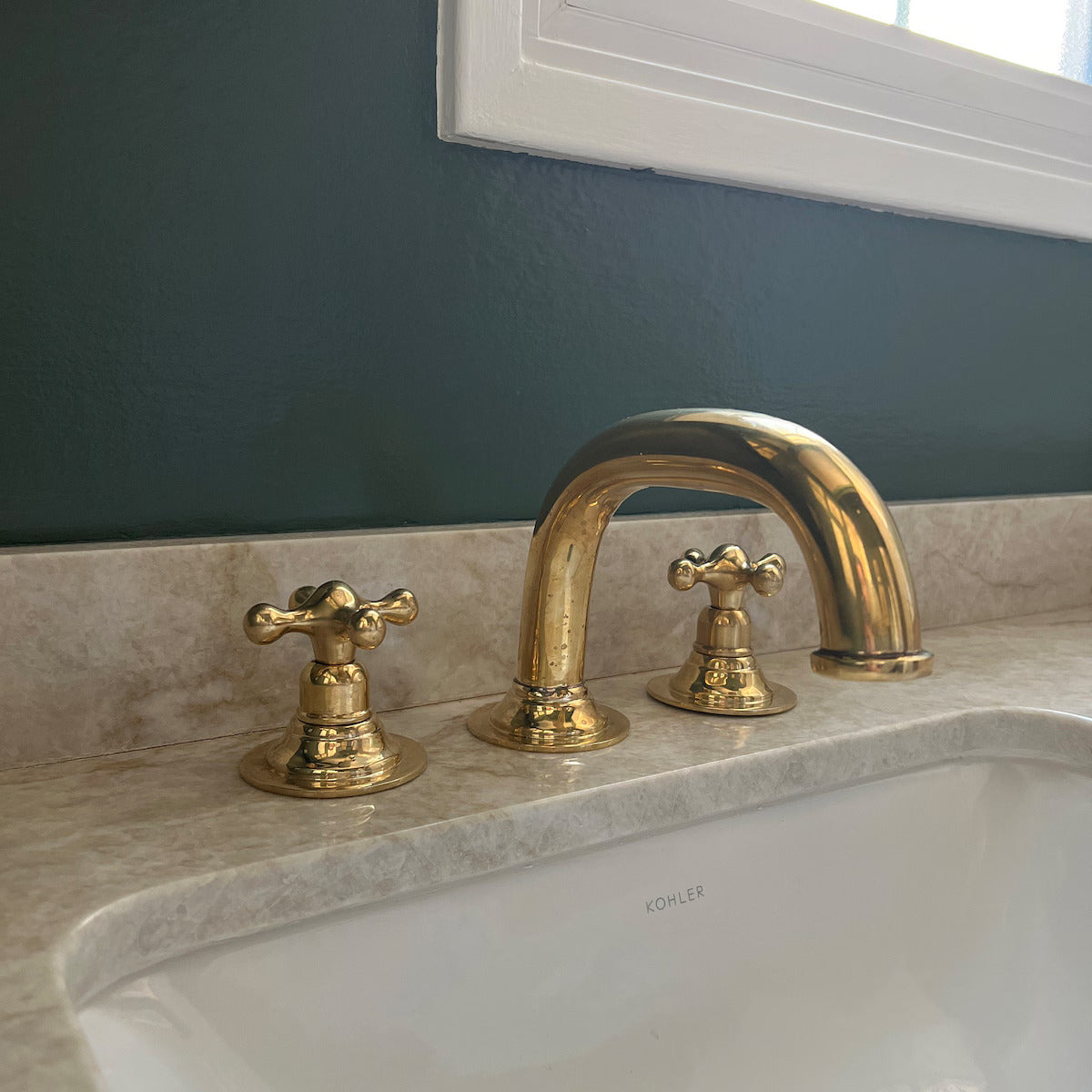 Handcrafted vintage and antique-style brass fixtures from TheHouseOfBrass, including high-quality faucets, sinks, and lighting for timeless interior design