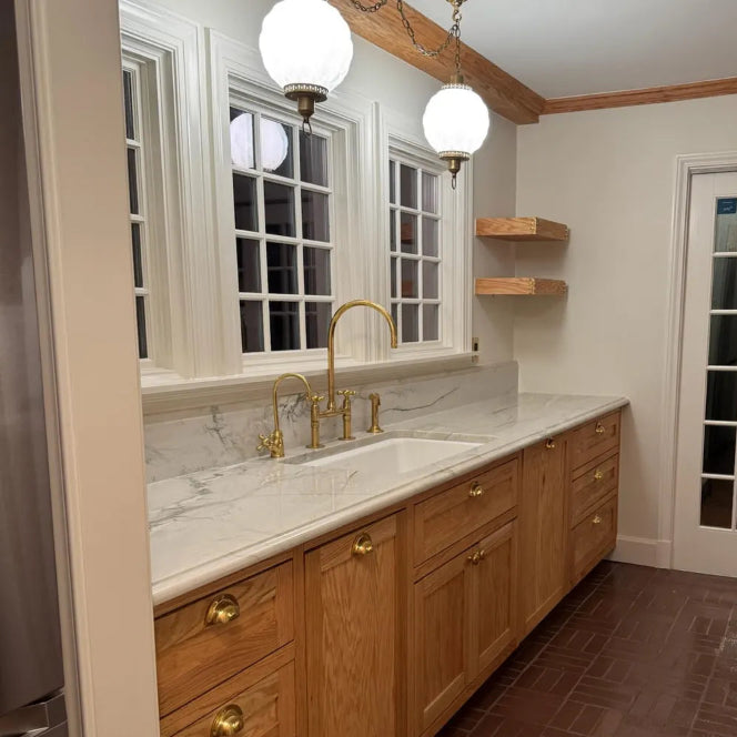 Handcrafted vintage and antique-style brass fixtures from TheHouseOfBrass, including high-quality faucets, sinks, and lighting for timeless interior design