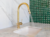 olid brass kitchen faucet before patina aging, bright gold tone