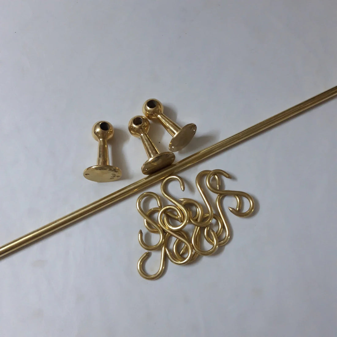 Unlacquered brass pot rack with solid brass S-hooks