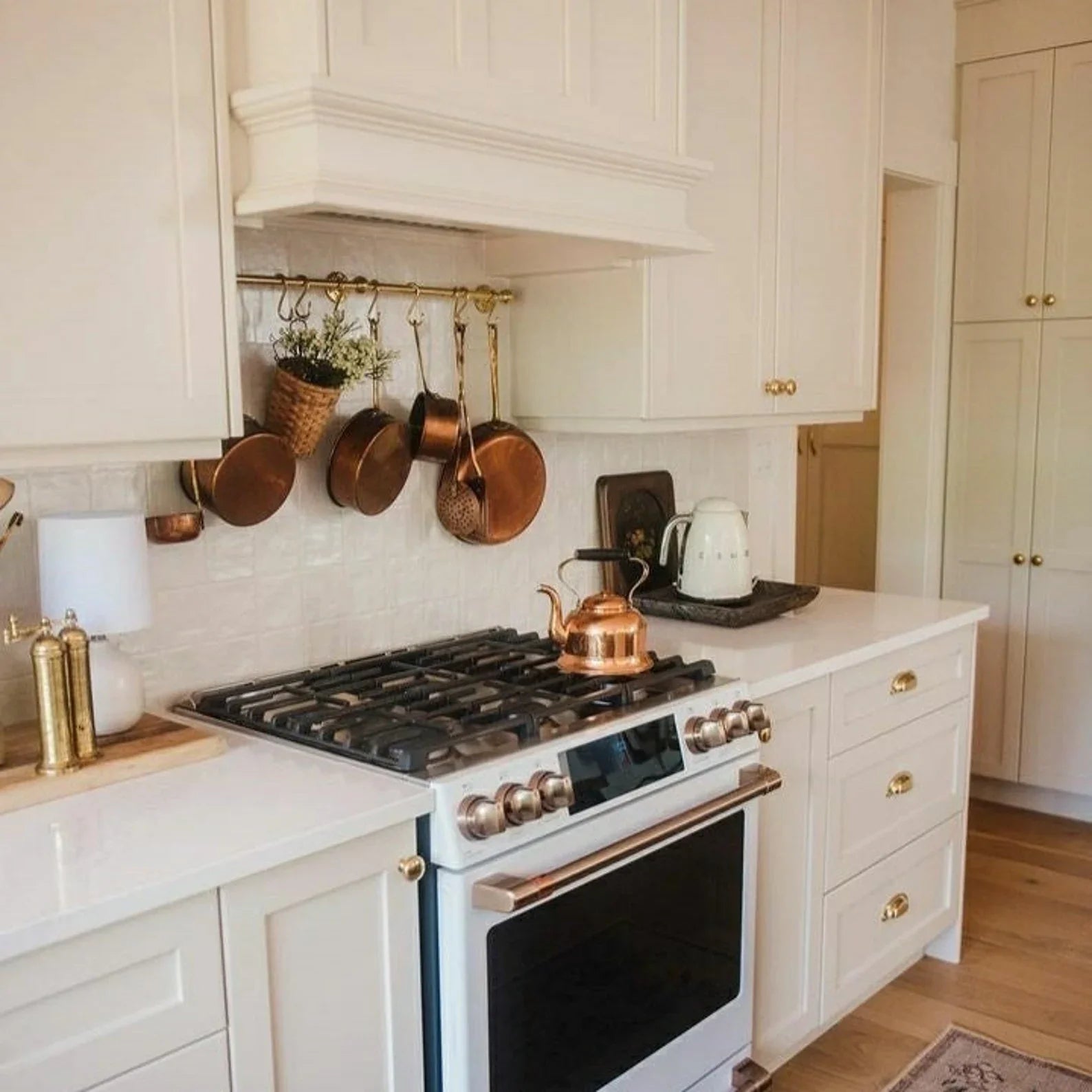 Unlacquered brass pot rack with solid brass S-hooks