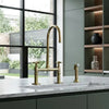Unlacquered brass kitchen faucet with linear legs