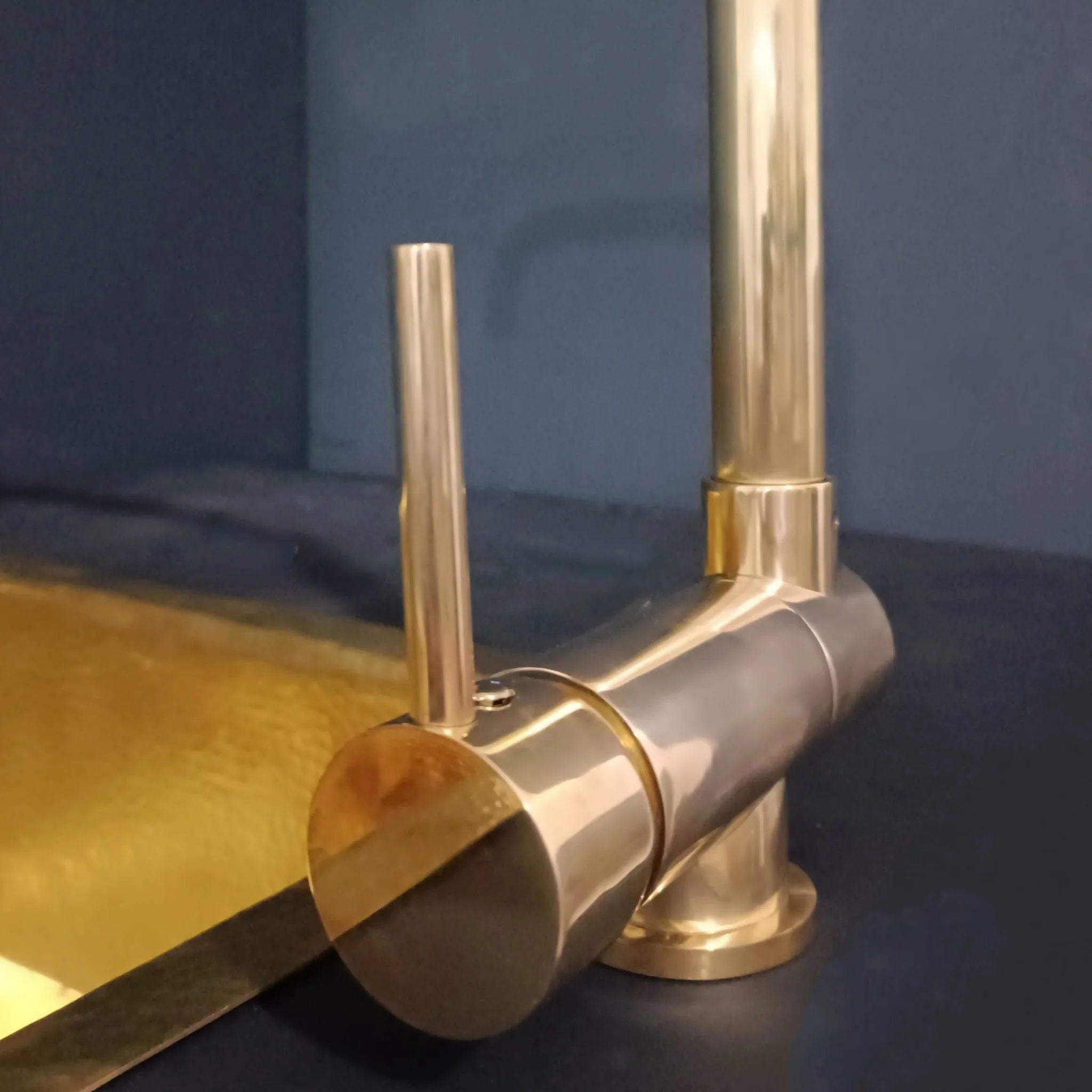The Foldable unlacquered brass mixer faucet with folding spout