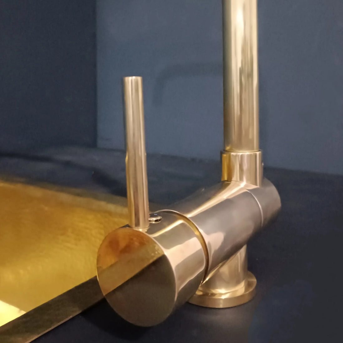 The Foldable unlacquered brass mixer faucet with folding spout