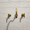 Unlacquered Brass Wall Mounted Faucet – Curved Spout, 9" Reach, Lead-Free | Solid Brass - The House Of Brass