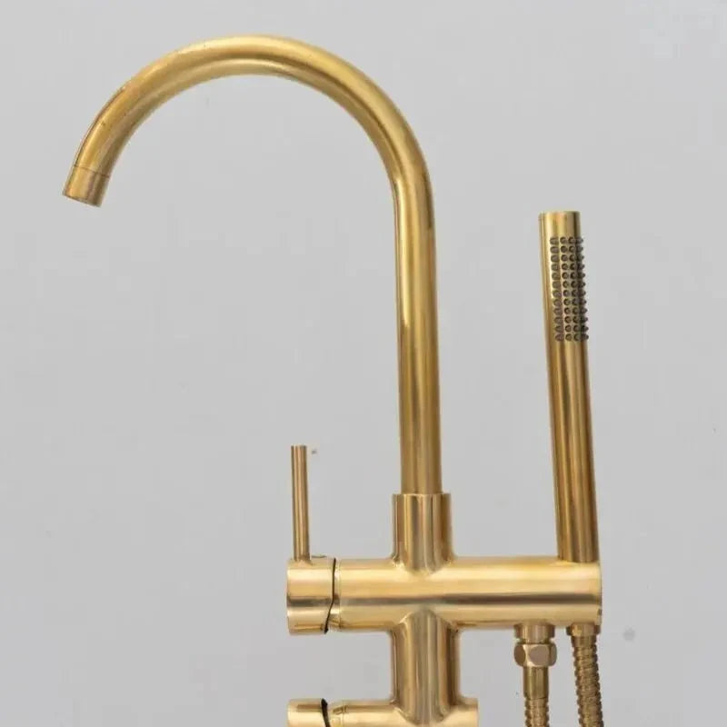 Unlacquered brass freestanding tub filler with hand shower